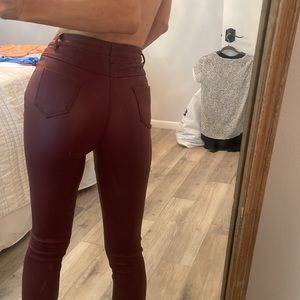 Red faux leather pants